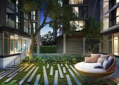 Courtyard area with seating in a modern residential building