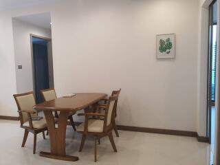 Dining area with a wooden table and chairs