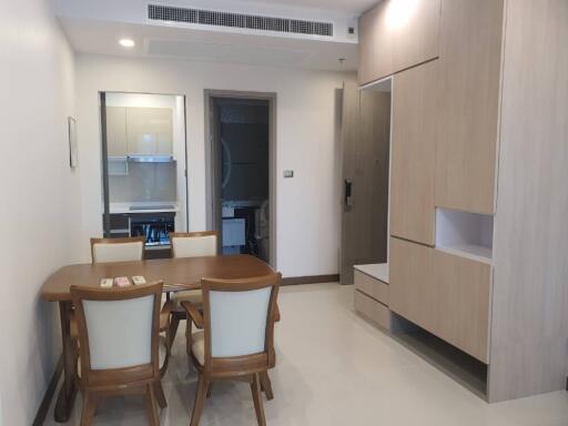 Modern dining area with wooden table and chairs