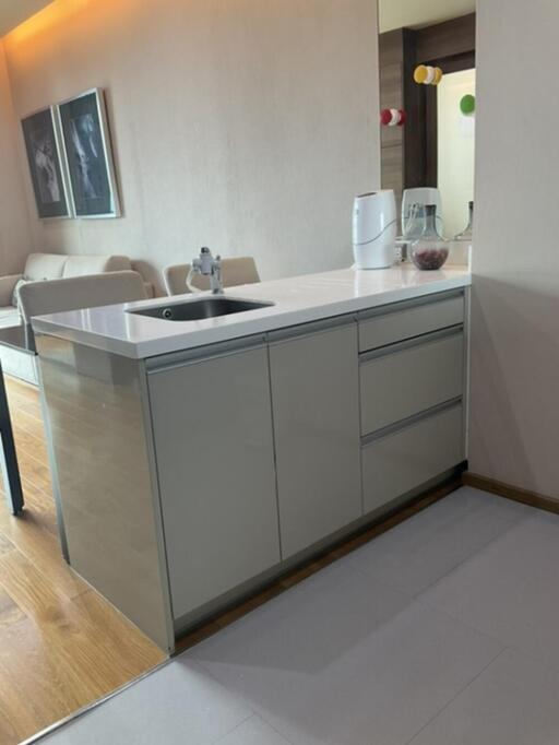 Modern kitchen with white countertop and sink