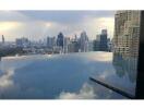 Rooftop infinity pool with city skyline view