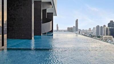 Infinity pool with city skyline view