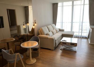 Modern living room with sectional sofa, table and chairs