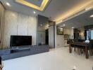 Modern living area with dining space and kitchen