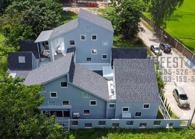 Aerial view of a large residential building with modern design