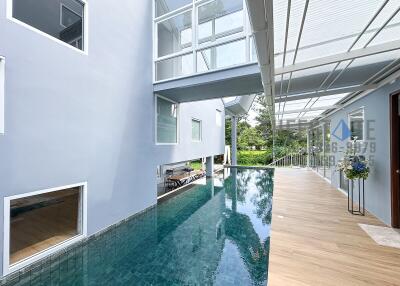 Modern house with indoor pool area and natural light