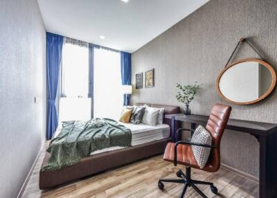 modern bedroom with a desk and chair