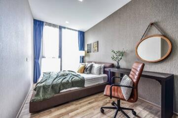 modern bedroom with a desk and chair