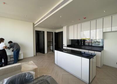 Modern kitchen with white cabinets and island