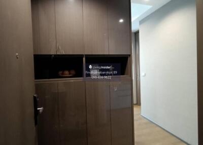 Modern hallway with built-in storage cabinets