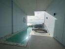 Outdoor area with small pool and ocean view