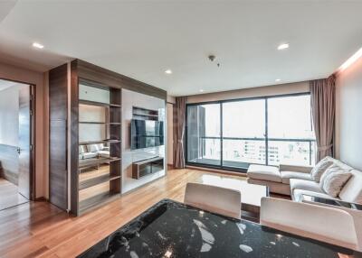 Spacious and modern living room with a large window