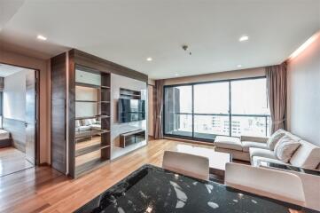 Spacious and modern living room with a large window