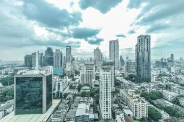 Aerial view of modern city skyline with tall buildings