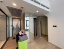 Modern hallway with luggage and mirrors