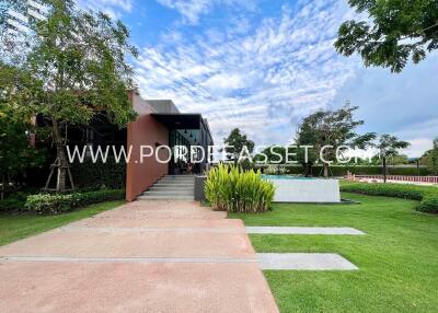 Modern building exterior with landscaped garden