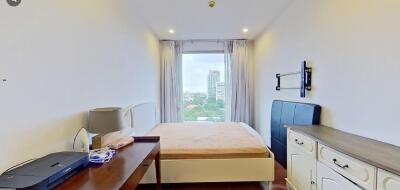 Bedroom with panoramic window view and minimalistic furniture