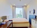 Bedroom with panoramic window view and minimalistic furniture