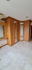 Bright and spacious bedroom with built-in wardrobe