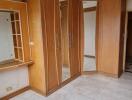 Bright and spacious bedroom with built-in wardrobe