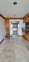 Spacious main living area with tile flooring