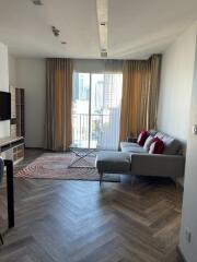 Living room with modern furniture and large window