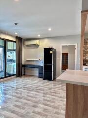 Modern kitchen with large windows and appliances