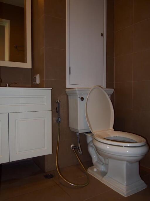 Bathroom with toilet and sink