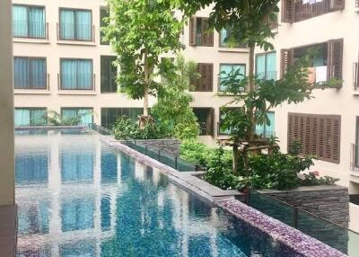 Outdoor Pool Area of the Apartment Building