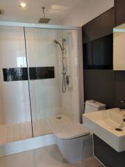 Modern bathroom with shower and fixtures