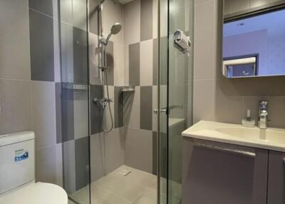 Modern bathroom with glass shower enclosure