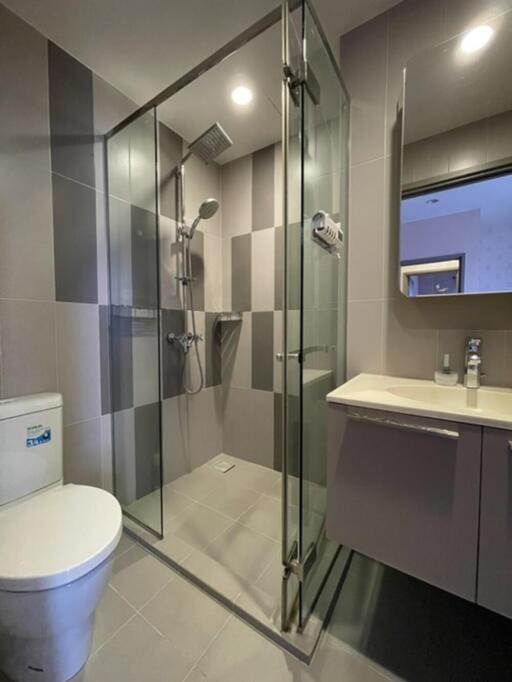 Modern bathroom with glass shower enclosure