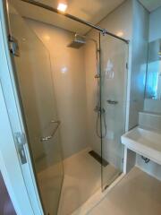 modern bathroom with glass shower enclosure