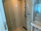 modern bathroom with glass shower enclosure