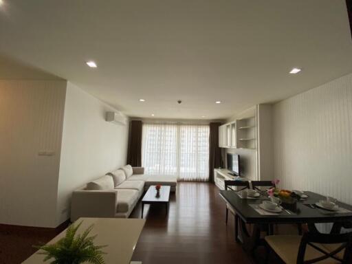 Spacious living room and dining area with modern furnishings