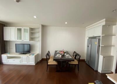 Living room with dining table and TV unit