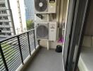 Apartment balcony with view of adjacent buildings