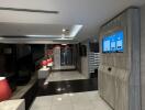 Modern building entrance lobby with digital directory