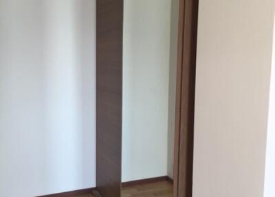 Bedroom with mirrored sliding door wardrobe