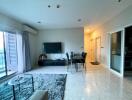 spacious living area with dining table and TV