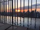 Infinity pool with city skyline view