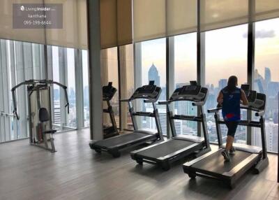 Modern gym with a city view