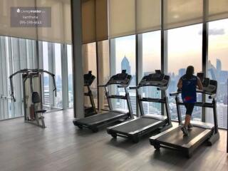 Modern gym with a city view