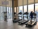 Modern gym with a city view