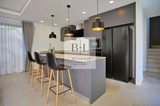 Modern kitchen with island and bar stools