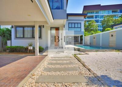 Modern house with pool and walkway