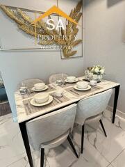 Modern dining area with a marble table setup