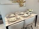 Modern dining area with a marble table setup