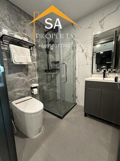 Modern bathroom with glass shower and vanity