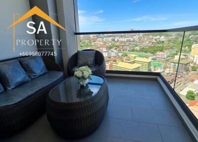 Balcony with outdoor seating and city view